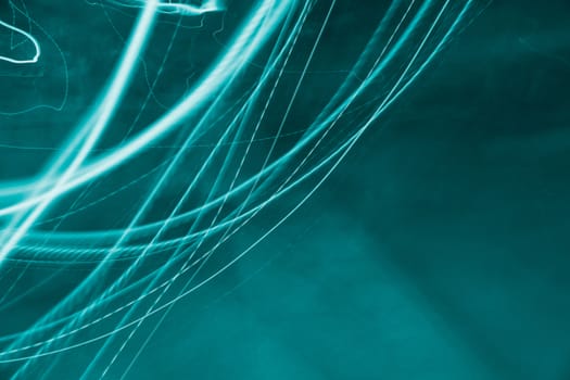 View of abstract lights on green background