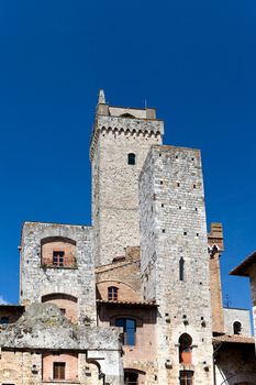  towers of the Ardinghelli family on Piazza della Cisterna in San Gimignano in tuscany in italy