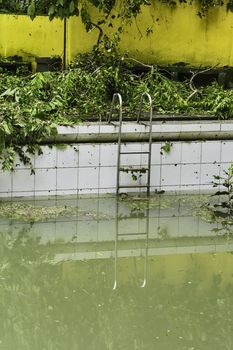 Dirty swimming pool after a strong typhoon