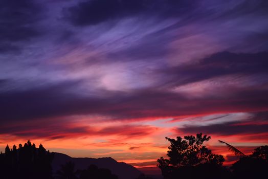 Beautiful purple orange sunset in a war-torn place.