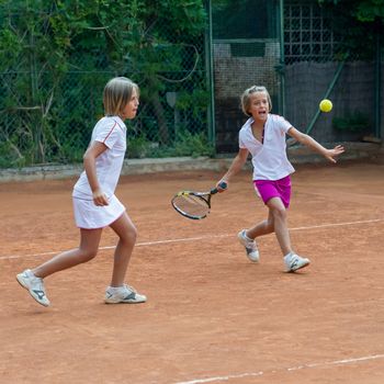 Children at school during a dribble of tennis