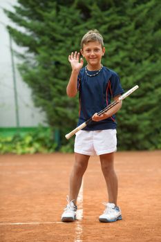 Children at school during a dribble of tennis