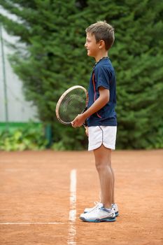 Children at school during a dribble of tennis