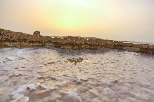 Salty water trapped in Rocks in Bugibba, Malta, Europe.