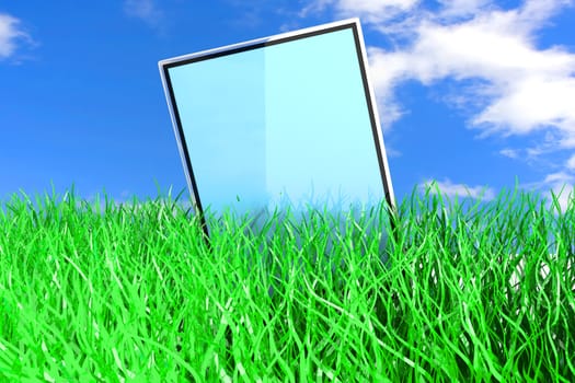 A Tablet PC in the Grass. 3D rendered Illustration.