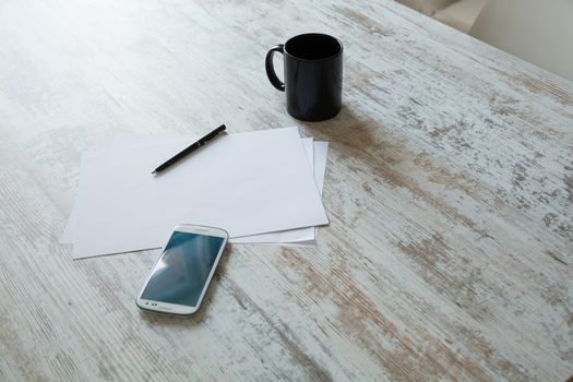 Brainstorming and taking notes at the table.