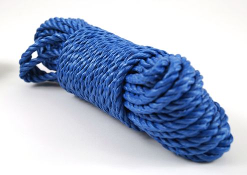 stock pictures of a coil and loop of blue rope