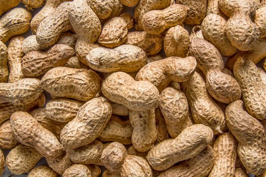 Pile of peanuts in shell background