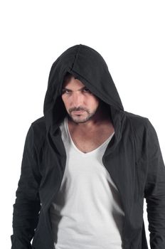 A male in a hood looks askance menacingly