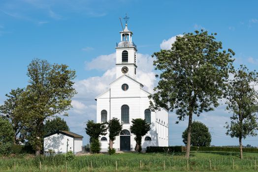 white christian church in holland village called simonshaven