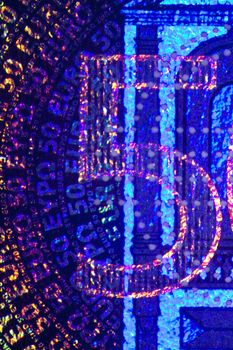Micro Photo of a Hologram on an Euro Bill
