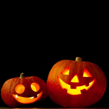 Halloween pumpkins isolated on black background