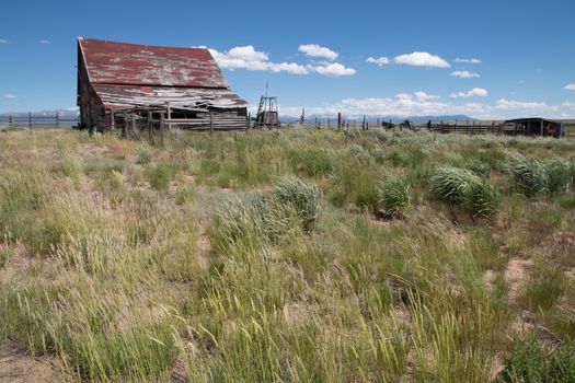 In the wind-swept area known as North Park, CO, is the Arapaho National Wildlife Refuge. This old barn has long been abandoned, and it just sits as the elements continue to take their toll.