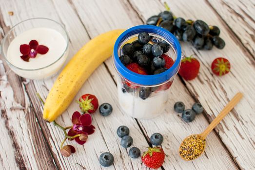 healthy organic fruit and nuts smoothie on wooden board