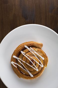 Cinnamon roll from above, can be vertical or horizontal.