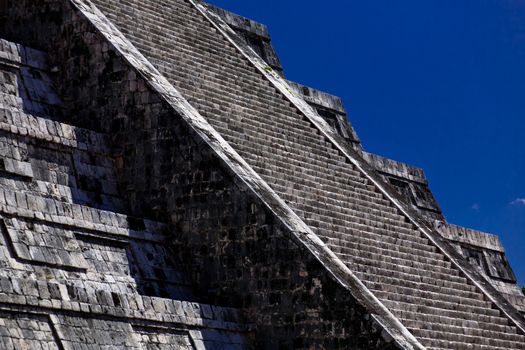 Detail of ancient stairs of a Mayan pyramid in Chichen Itza Archaeological site in Yucatan Peninsula, Mexico