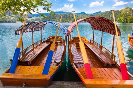Traditional wooden boats on picture perfect lake Bled, Slovenia.