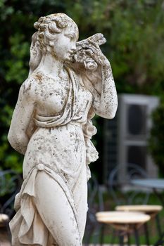 Classical statue in the ornamental garden.