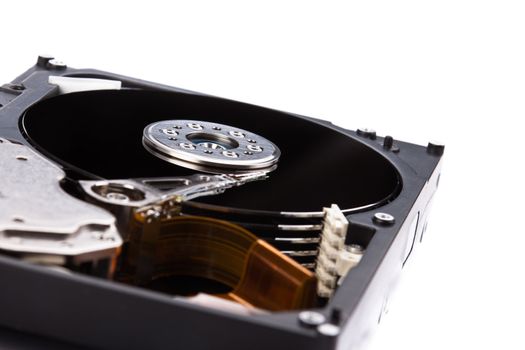 an opened hard disk on white background