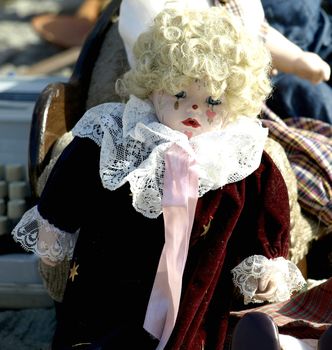 Old doll for sale at antiques fair       