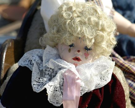 Old doll for sale at antiques fair   