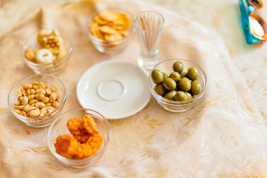 nuts, olive, rices and other appetizer served in italian bars
