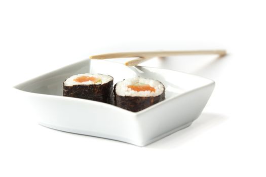 Two Maki Sushi in a white tray isolated on white background