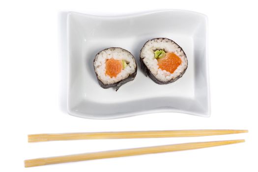 Two Maki Sushi in a tray shots from above isolated on white background with chopsticks