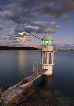 Cremorne Point Lighthouse on Sydney Harbour at dusk.  Long exposure