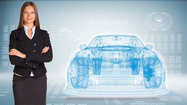 Businesswoman with wire frame car. High-tech graphs at backdrop