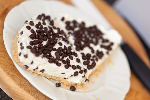 Delicious homemade yochurt cake topped with chocolate pieces