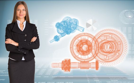 Businessman with wire frame gears. High-tech graphs at backdrop