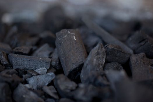 macro shot of some unlit wood coal