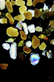 Micro photography of sand grains in polarized light
