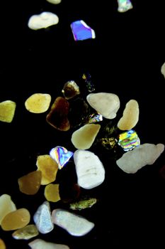 Micro photography of sand grains in polarized light