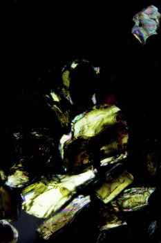 Micro photography of sand grains in polarized light