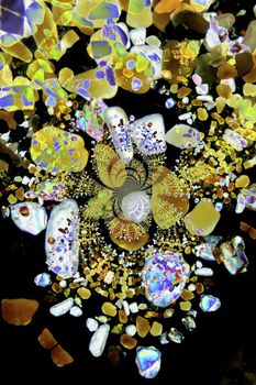 Micro photography of sand grains in polarized light, kaleidoscopic