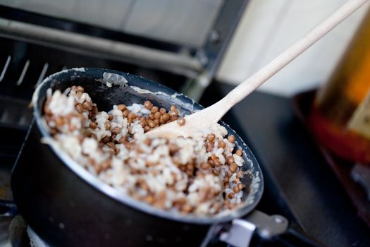 Rice and lentils in a dirty kitchen