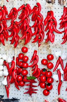 Hanged peppers in the city of alberobello, apulia, italy