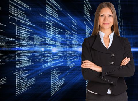Businesswoman in a suit with background of glowing digital code. Business concept
