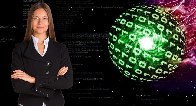 Businesswoman in a suit. Spheres of glowing digits on background