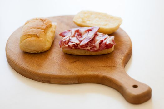 a delicious sandwich filled with italian salami (coppa di parma)