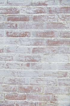 Weathered white brick wall, background. Home related