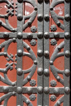 Detail of a old door in wood and wrought iron. Basilica of Santa Maria del Mar in Barcelona, Catalonia, Spain