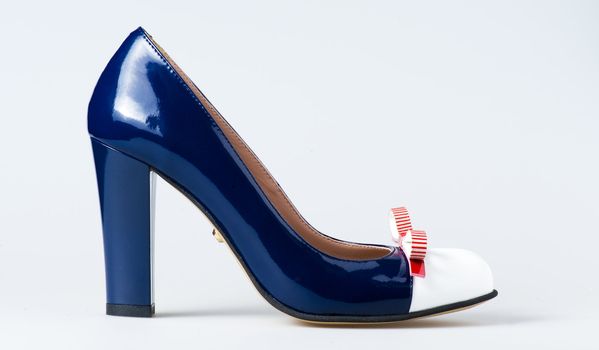 Woman blue shoes on white background