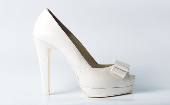 Woman white shoes on white background