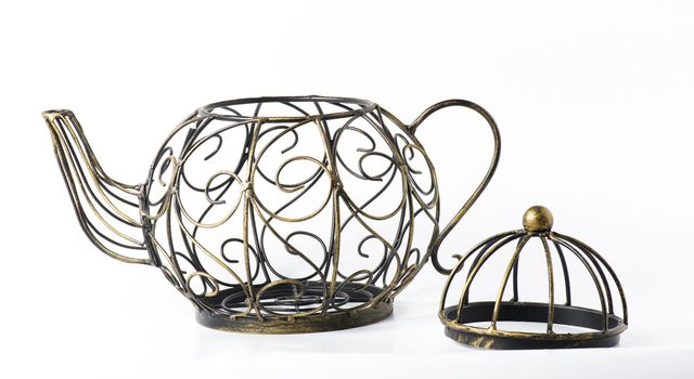 Metal wireframe teapot on white for decoration