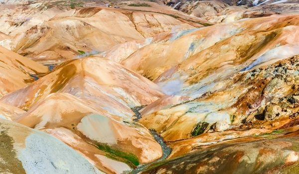 Colorful geothermal hot spring field and hills in Kerlingafjoll, Iceland