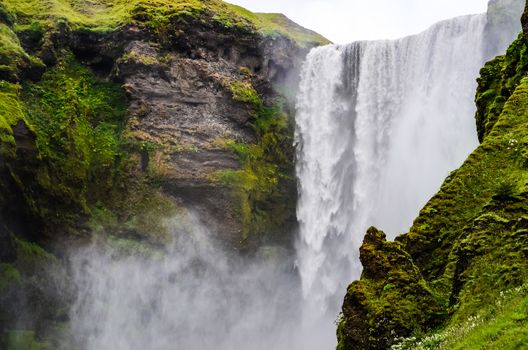 Detail of wild Skogafoss waterfall near Skogar, Iceland