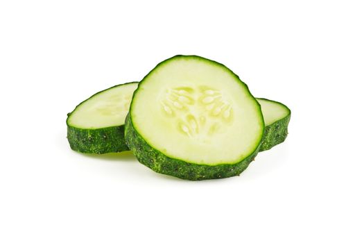 A few slices of cucumber on white background